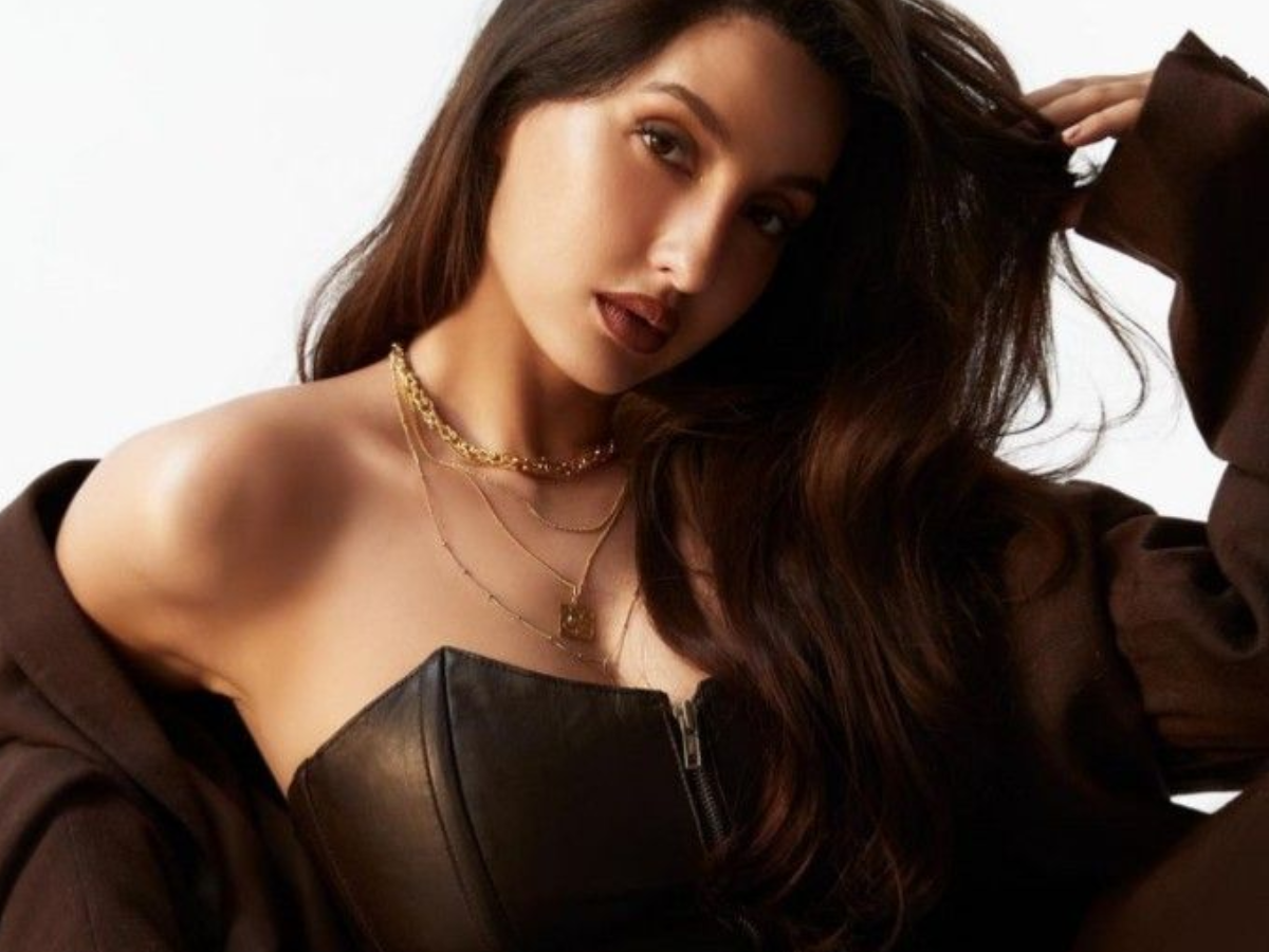 नोरा फतेही की इन तस्वीरों ने बढ़ाई जून की गर्मी , इंटरनेट पर मचा रही हैं धमाल - Photo Gallery