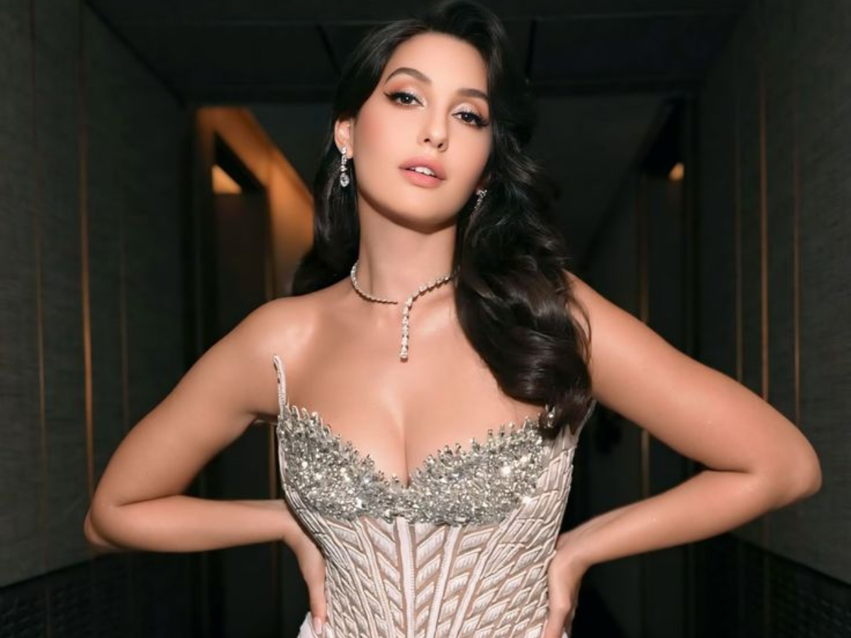 नोरा फतेही की इन तस्वीरों ने बढ़ाई जून की गर्मी , इंटरनेट पर मचा रही हैं धमाल - Photo Gallery