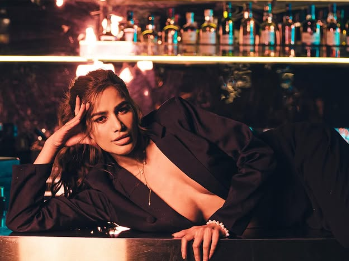 Poonam Pandey sets the camera on fire in a black blazer - Photo Gallery