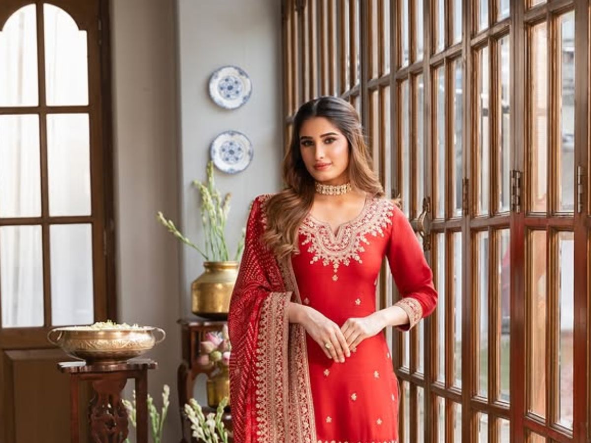 Rasha showed her beauty in a red suit - Photo Gallery