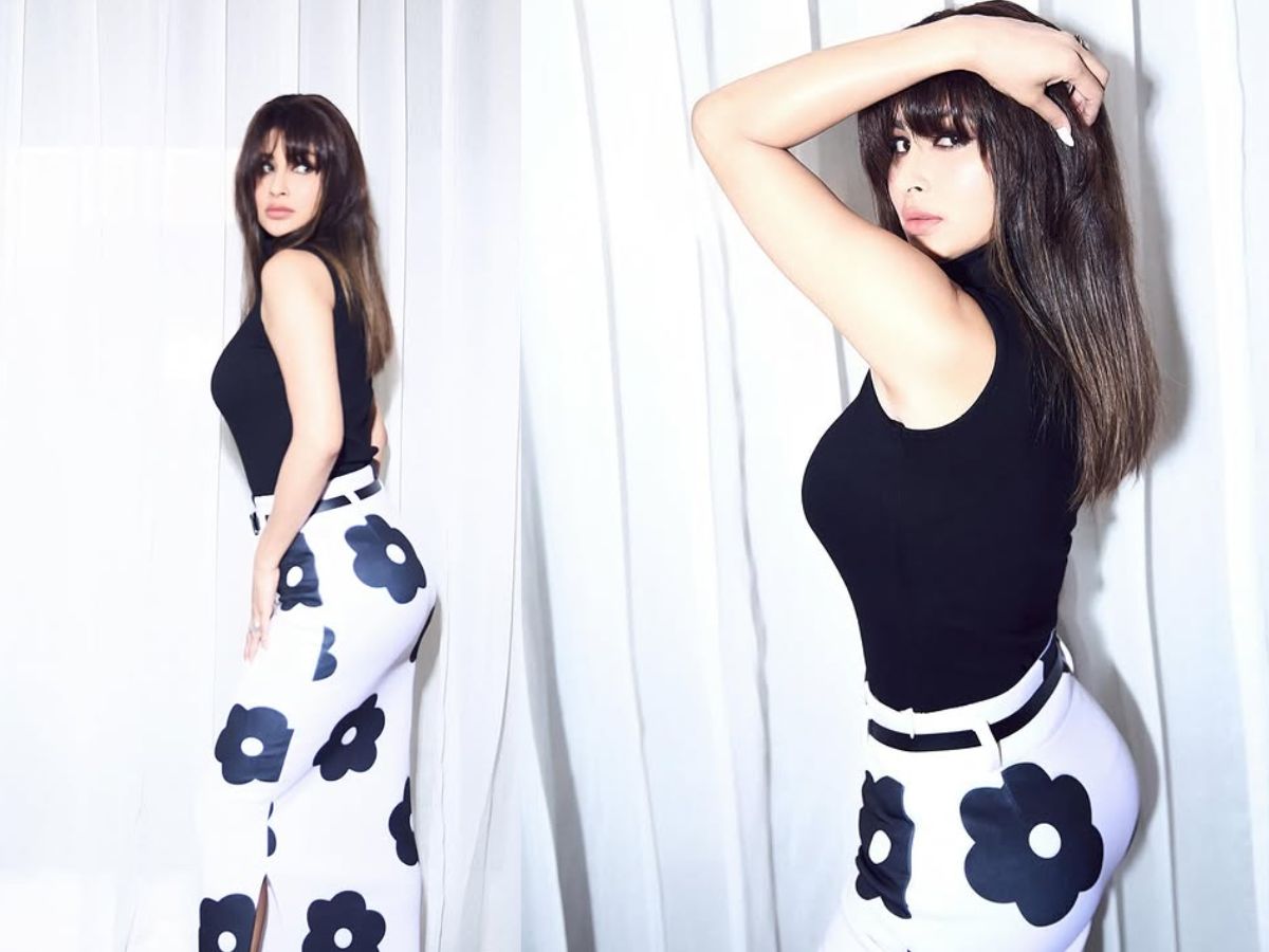 Mouni Roy's sexy look in white skirt - Photo Gallery