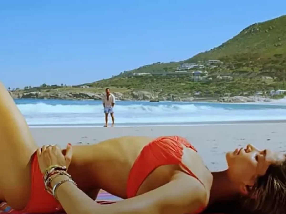 Posing on the beach in a red bikini - Photo Gallery