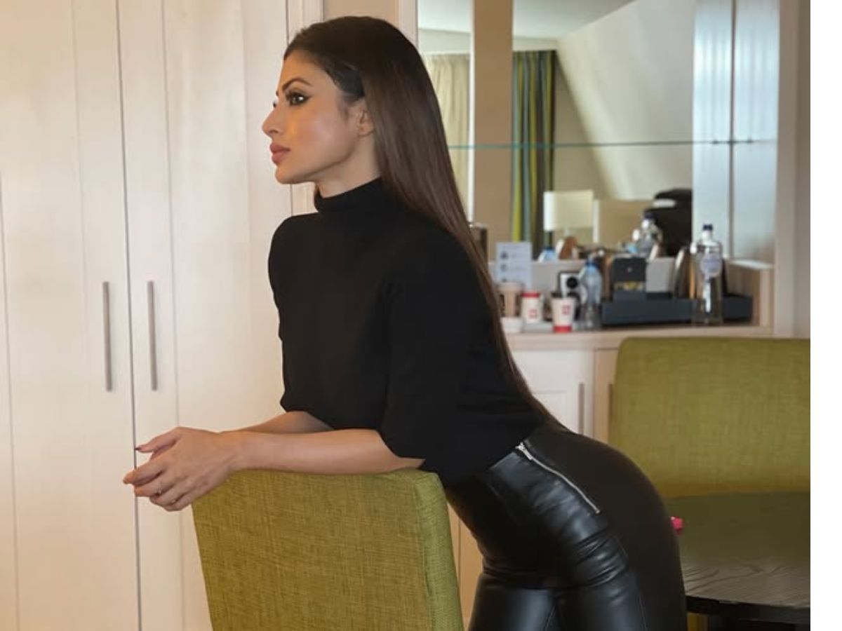 Mouni Roy gave a killer pose while sitting on the sofa. - Photo Gallery