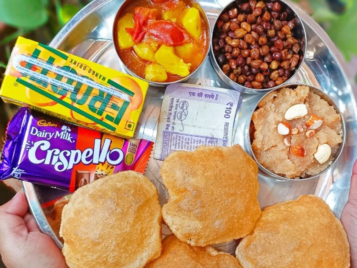 Halwa Puri and black gram are offered as Prasad. - Photo Gallery
