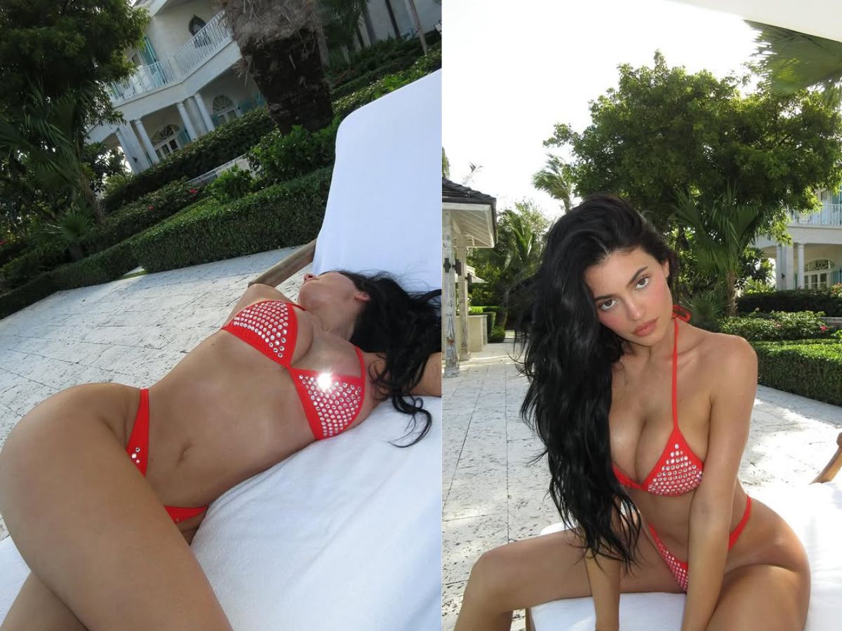 Lying on the bed, she gave a hot pose in a red bikini. - Photo Gallery