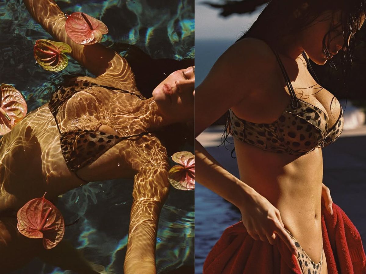 Taking a dip in the water wearing a leopard print bikini - Photo Gallery