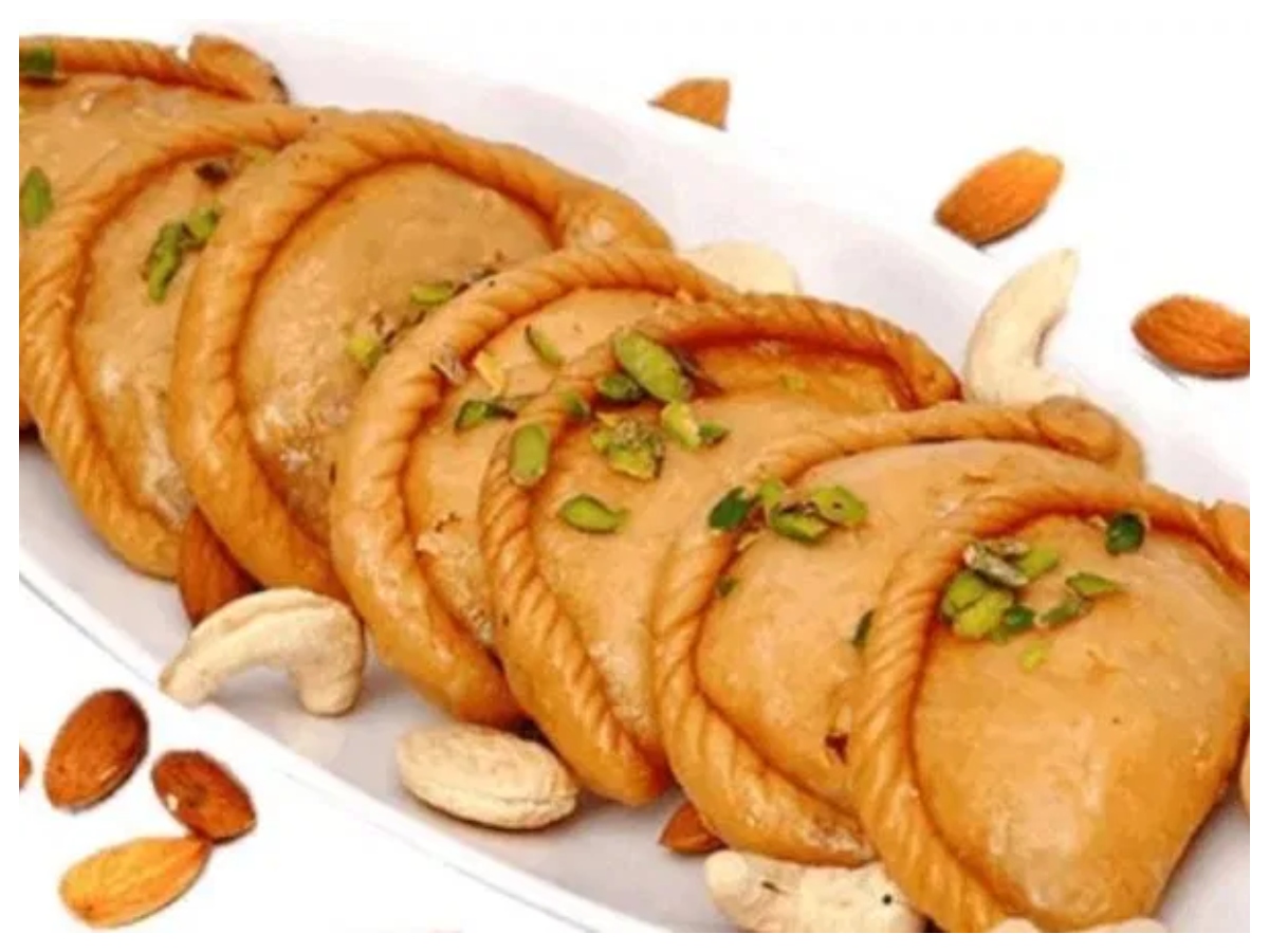 Holi Gujhiya Recipe:बिना मावा के बनाएं ये स्वादिस्ट गुझिया,जानें आसान रेसिपी - Photo Gallery